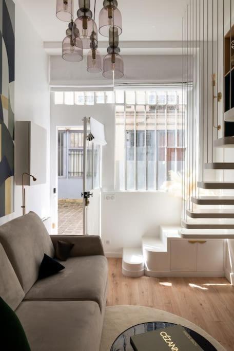 Bel Appartement D'Architecte Au Coeur De París Exterior foto