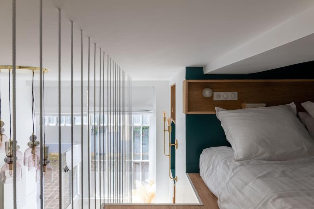Bel Appartement D'Architecte Au Coeur De París Exterior foto
